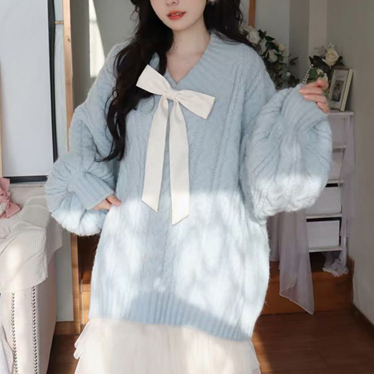 Ladies Large knitted sweater with bow detail and cable knit pattern Lune London