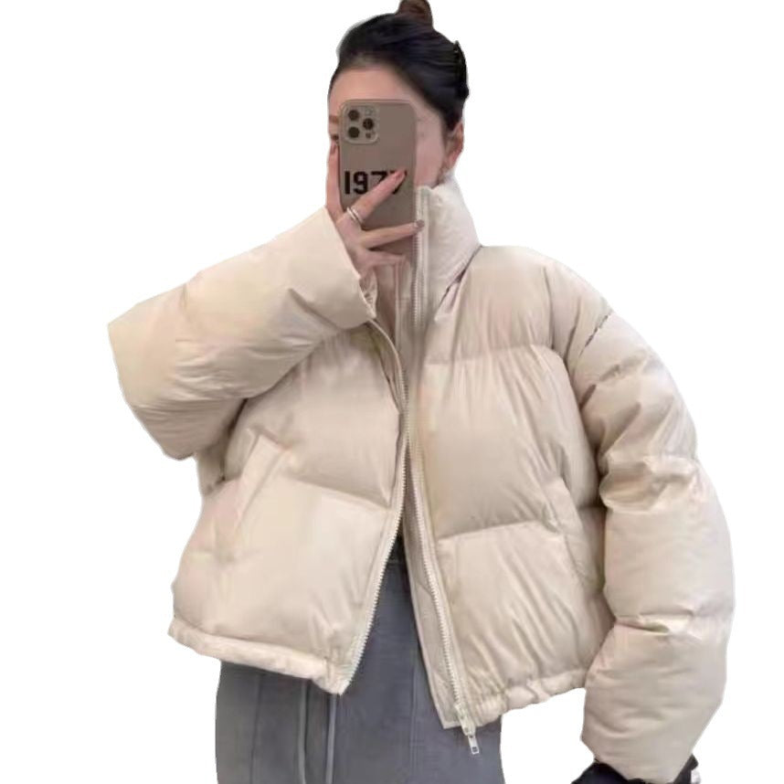 Ladies short functional quilted jacket with high collar and side pockets Lune London