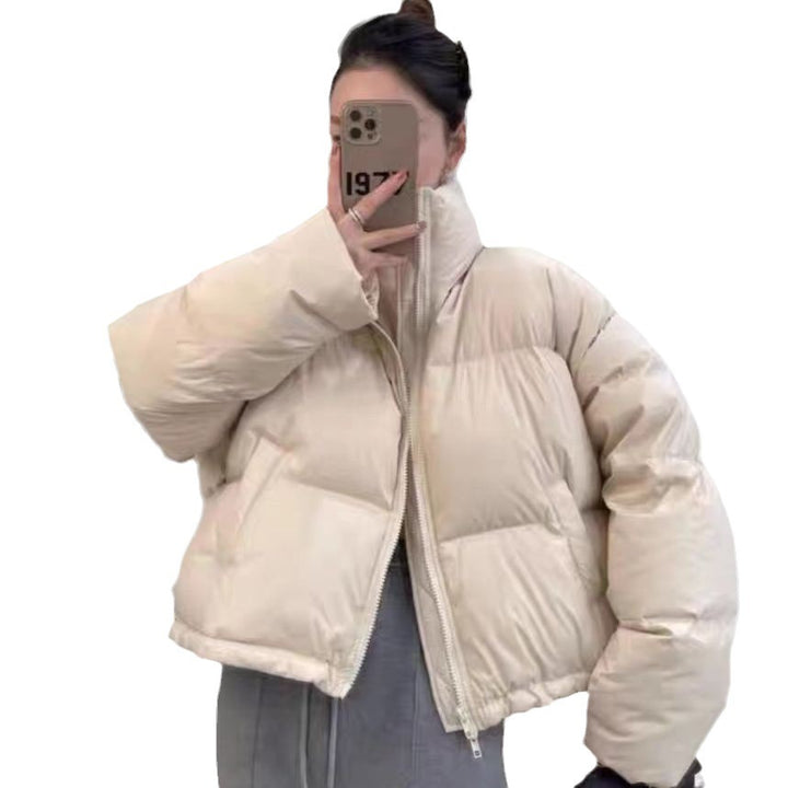 Ladies short functional quilted jacket with high collar and side pockets Lune London