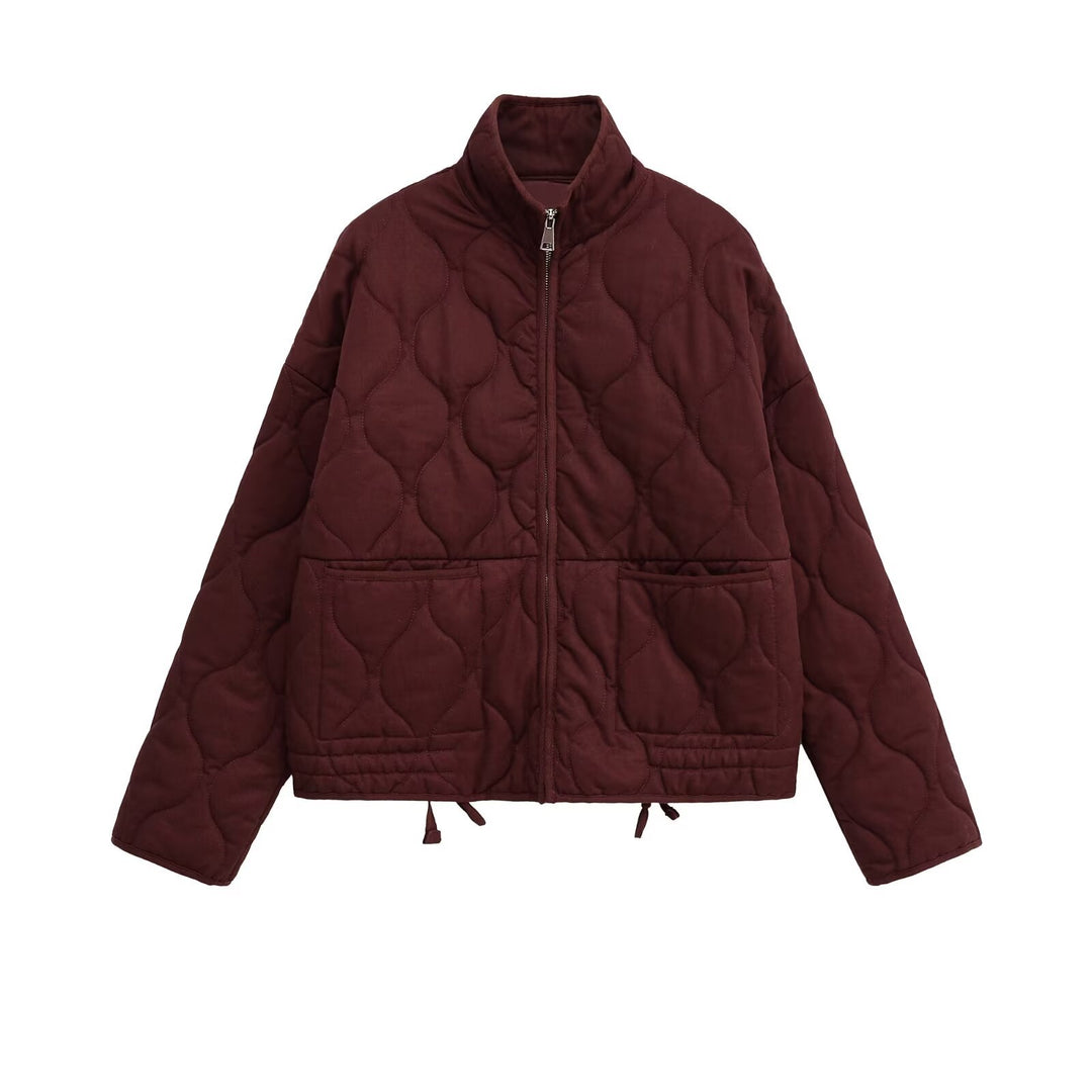 Ladies quilted transition jacket with high collar and practical pockets Lune London