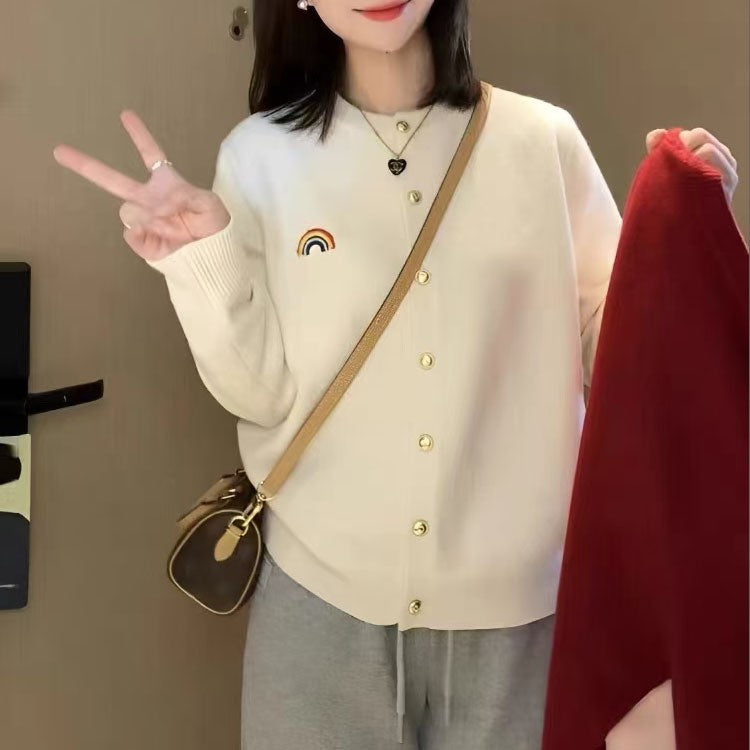 Knitted jacket for women with rainbow pattern and button detail Lune London
