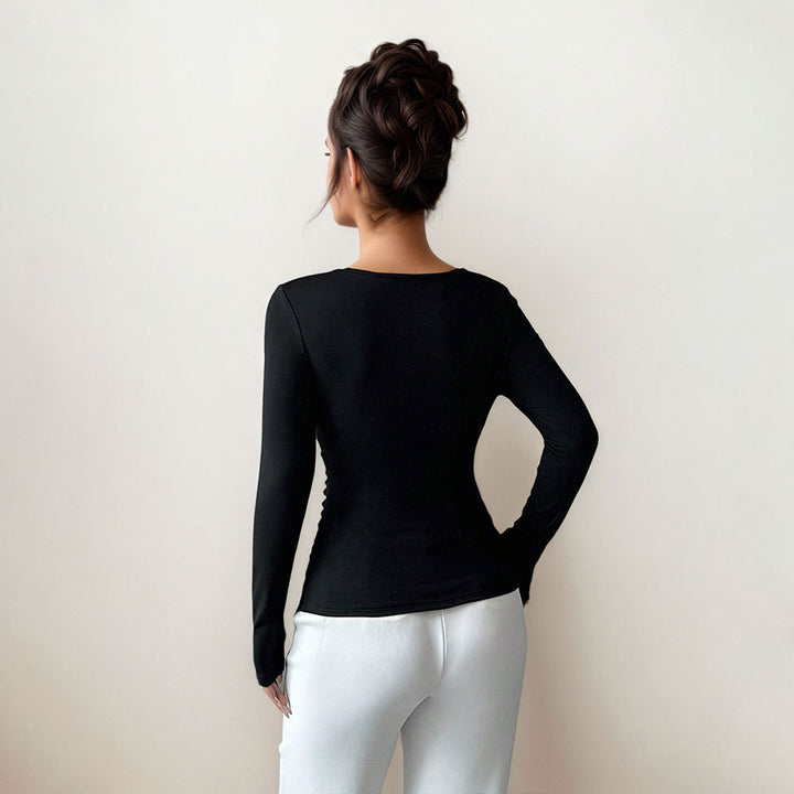 Top à manches longues ajusté pour femmes avec détail élégant en torsion Chic & Stil