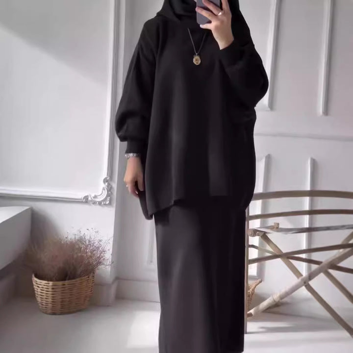 Elegant set for women made up of a casual sweater and a chic midi skirt.