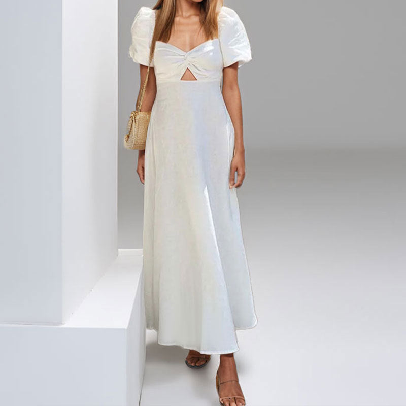 Robe maxi pour femmes avec un design clé sophistiqué et des manches puff volumineuses Chic & Stil