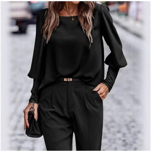 Elegant women's blouse with puff sleeve details and structured fabric Lune London