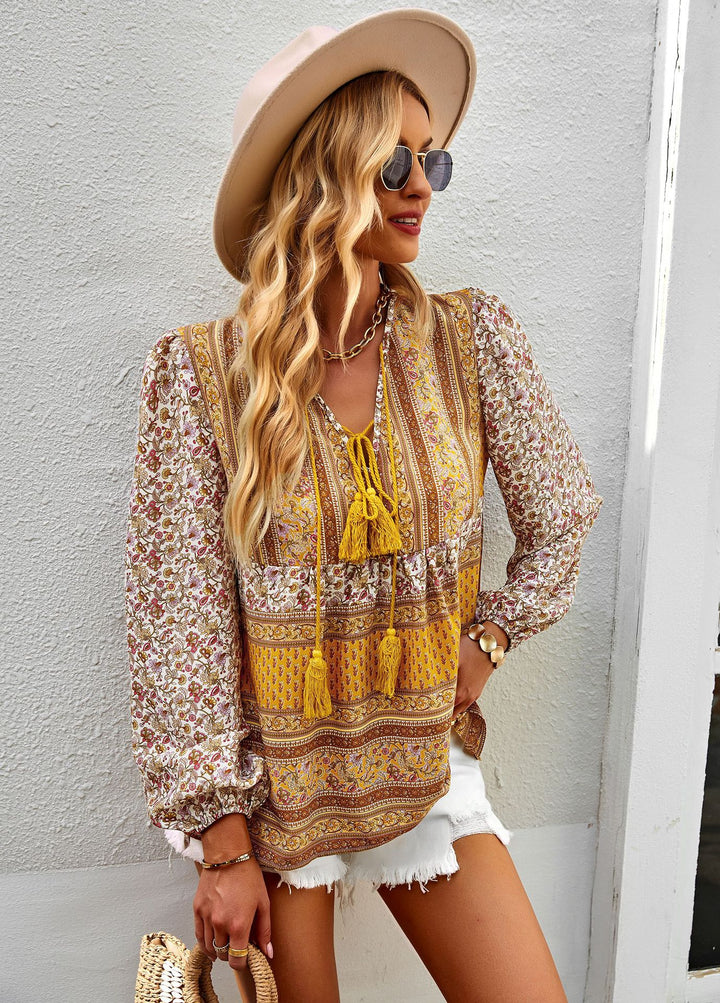 Airy women's blouse with trendy boho pattern and elegant ruffle details Lune London