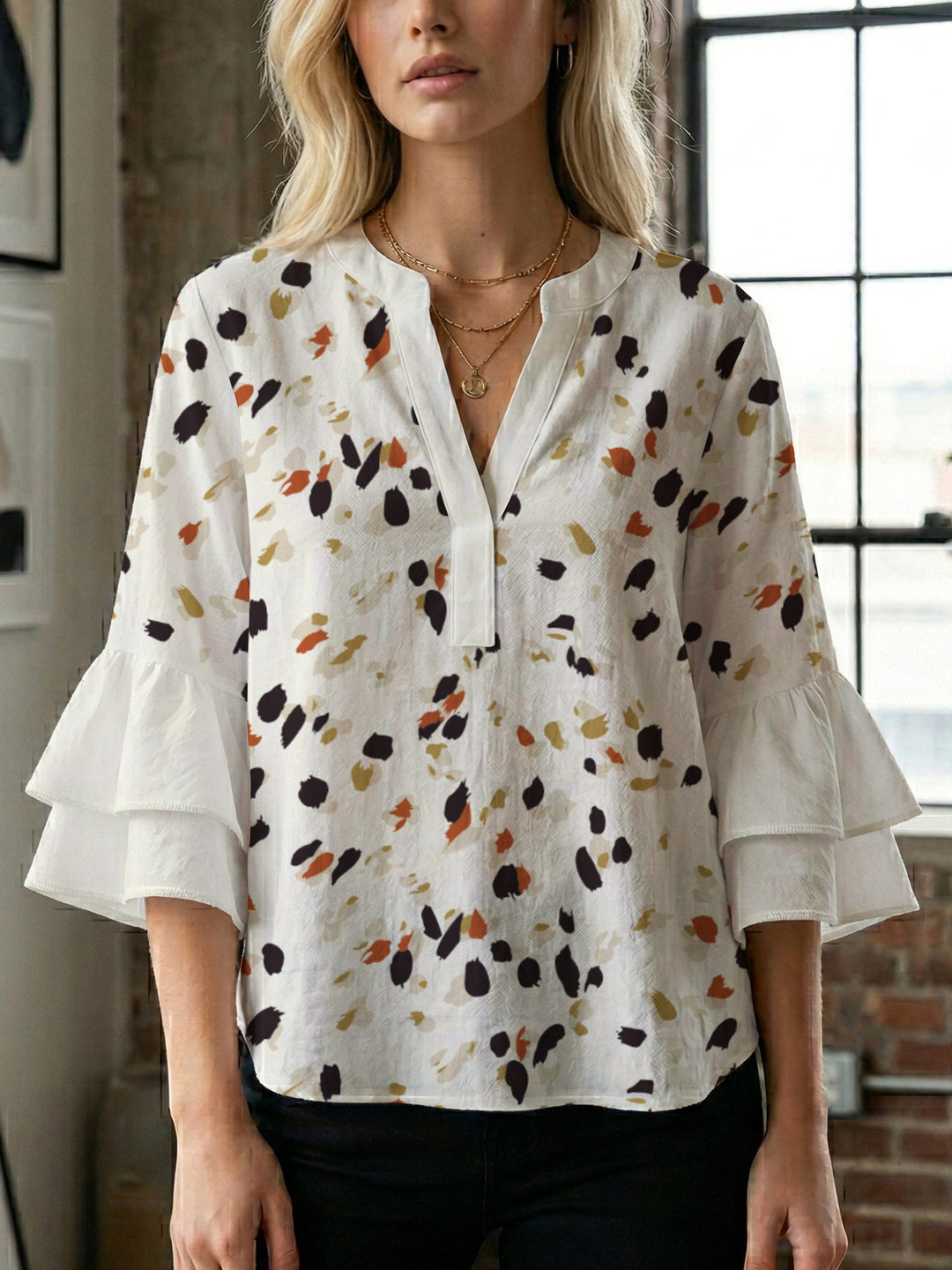 Women's blouse with voluminous ruffled sleeves and modern design Lune London