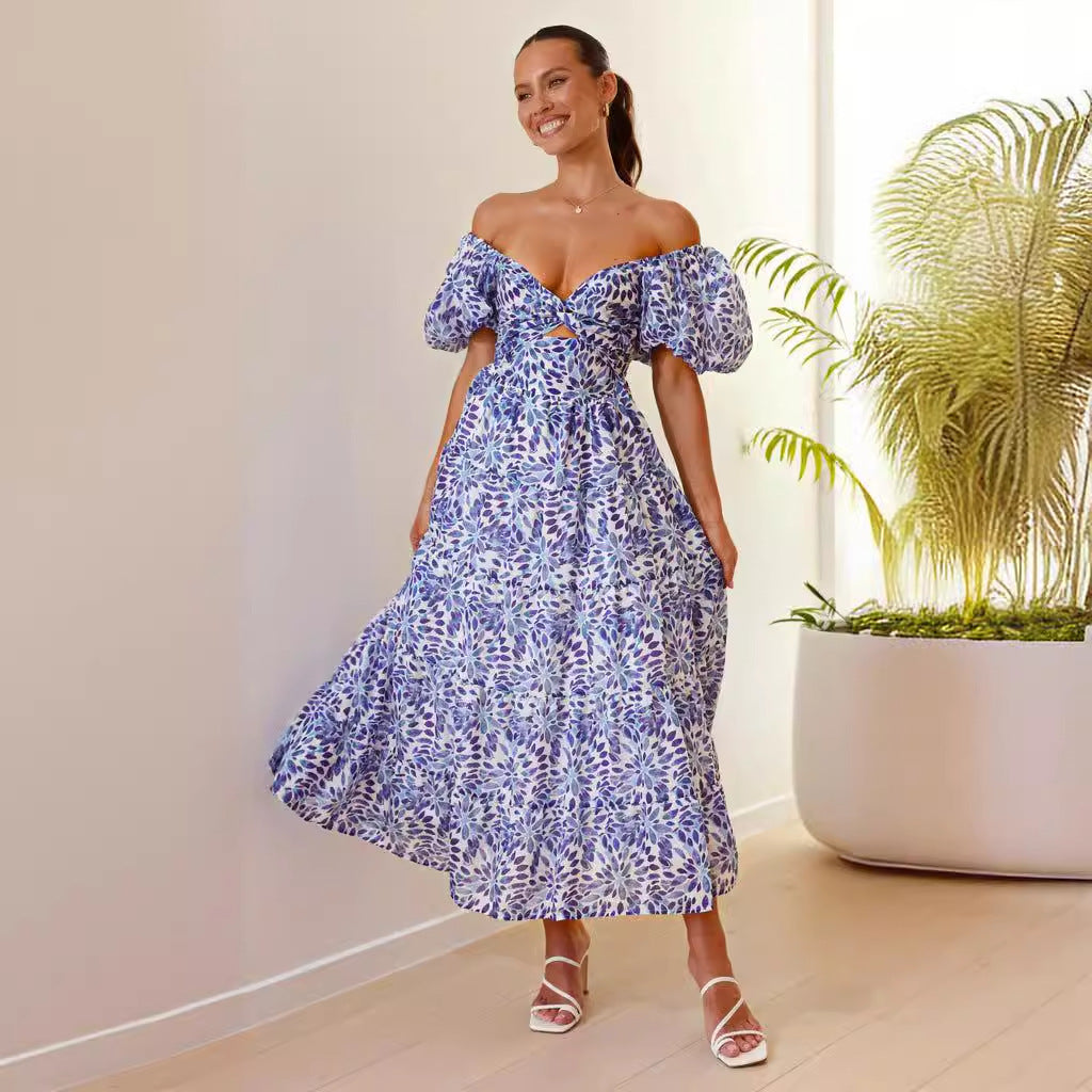 Maxi dress for women with a sophisticated design featuring off-the-shoulder and voluminous puff sleeves Chic & Stil