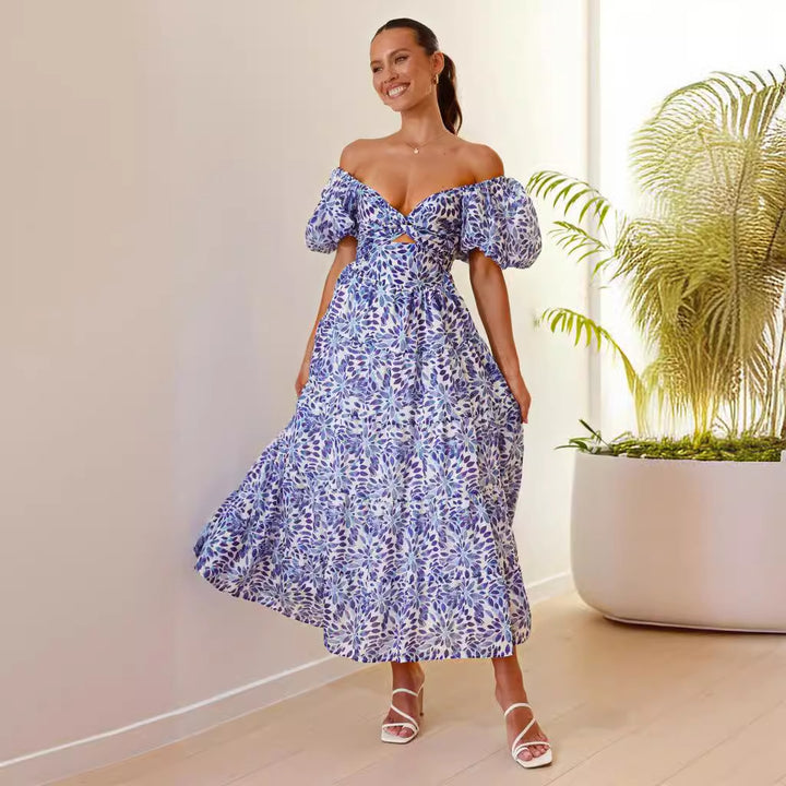 Maxi dress for women with a sophisticated design featuring off-the-shoulder and voluminous puff sleeves Chic & Stil