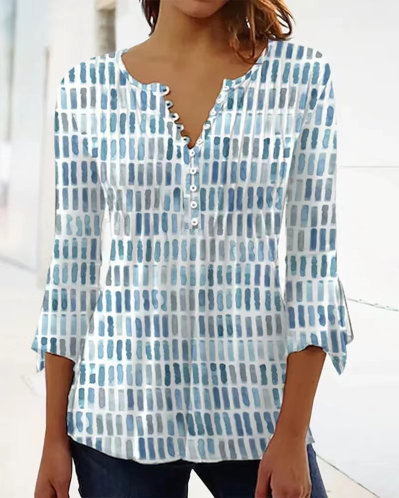 Blouse pour femmes au design graphique moderne avec détails de boutons Chic & Stil