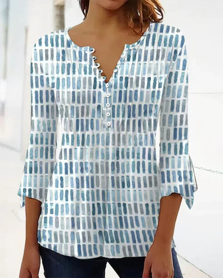 Blouse pour femmes au design graphique moderne avec détails de boutons Chic & Stil