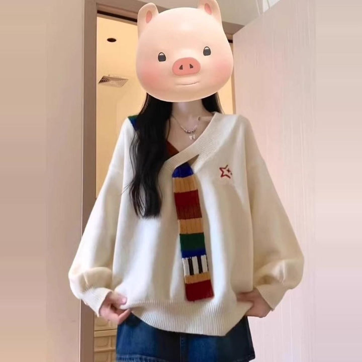 Pull élégant pour femme avec col en V et rayures colorées Chic & Stil