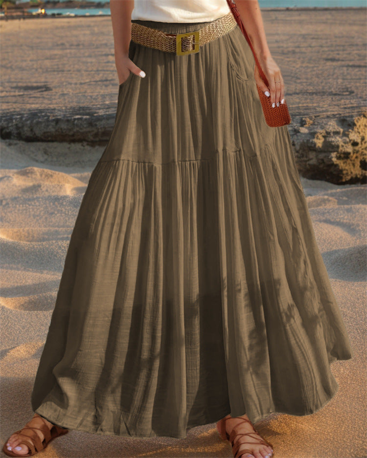 Maxi flared skirt for women with elegant pleated draping and practical pockets Lune London
