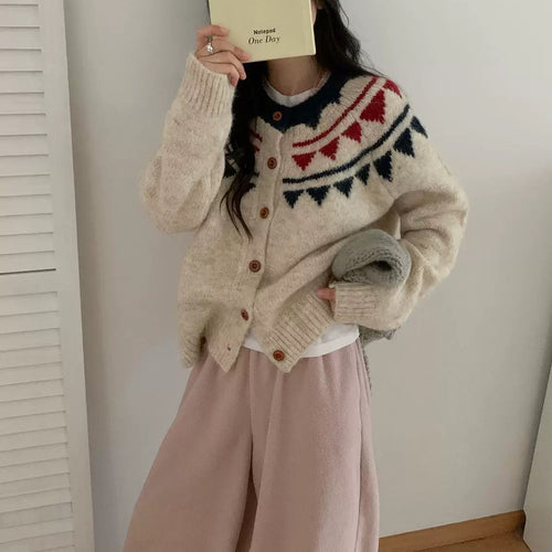 Chunky knit cardigan for women with elaborate colorful pattern and comfortable button closure Lune London