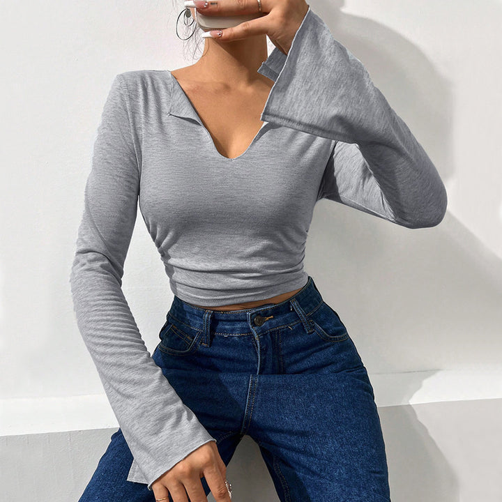 Short women's shirt with trendy bell sleeves and an elegant V neck Chic & Stil