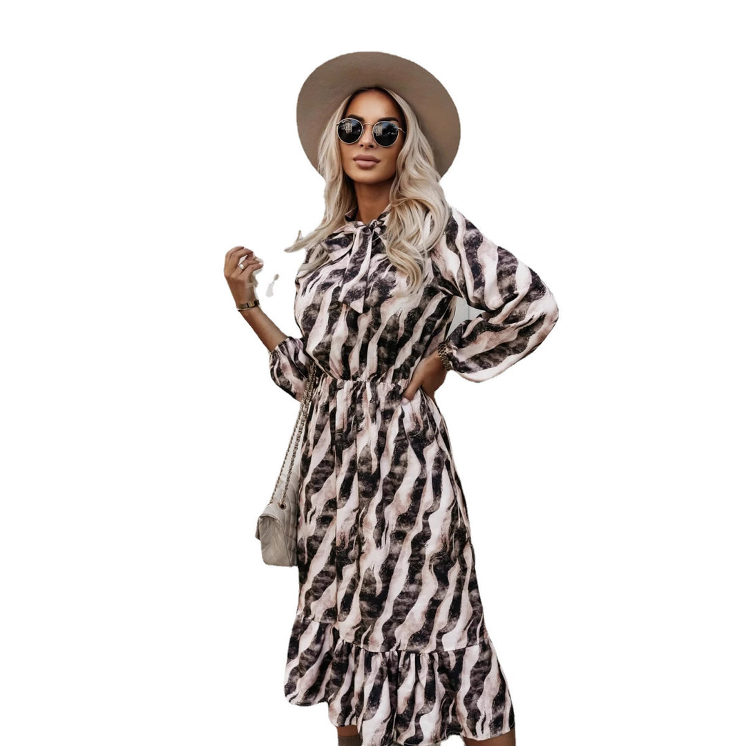 Boho striped midi dress for women with ruffles at the bottom Lune London