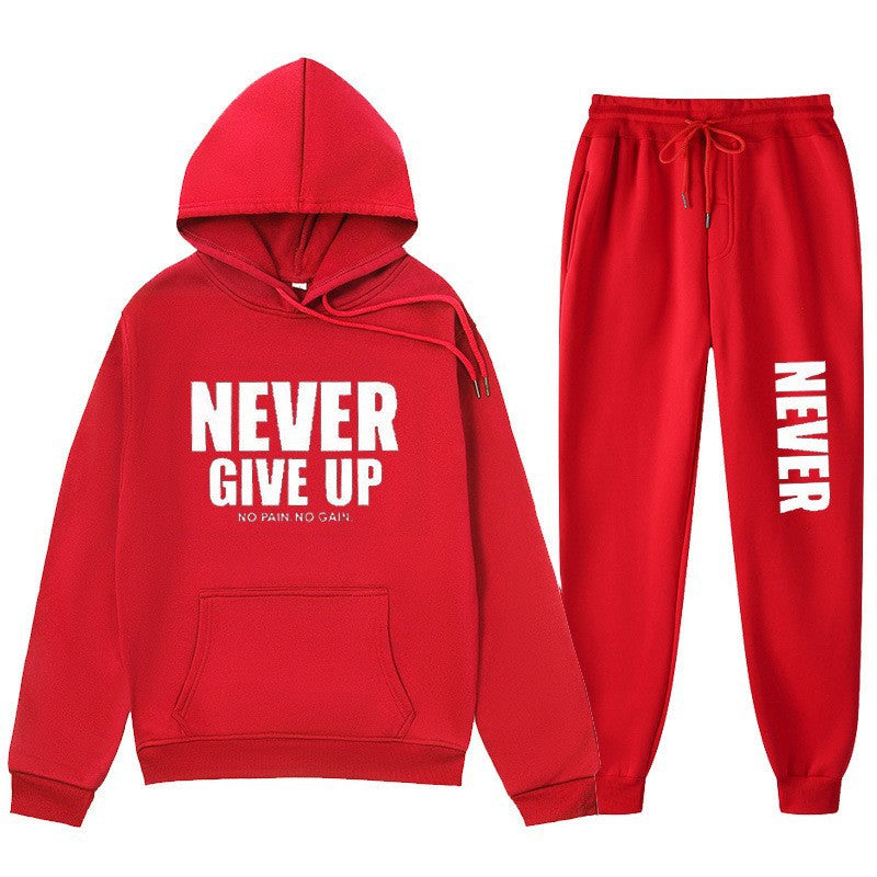 Women's training pullover and jogging pants in motif set with motivating print Chic & Stil