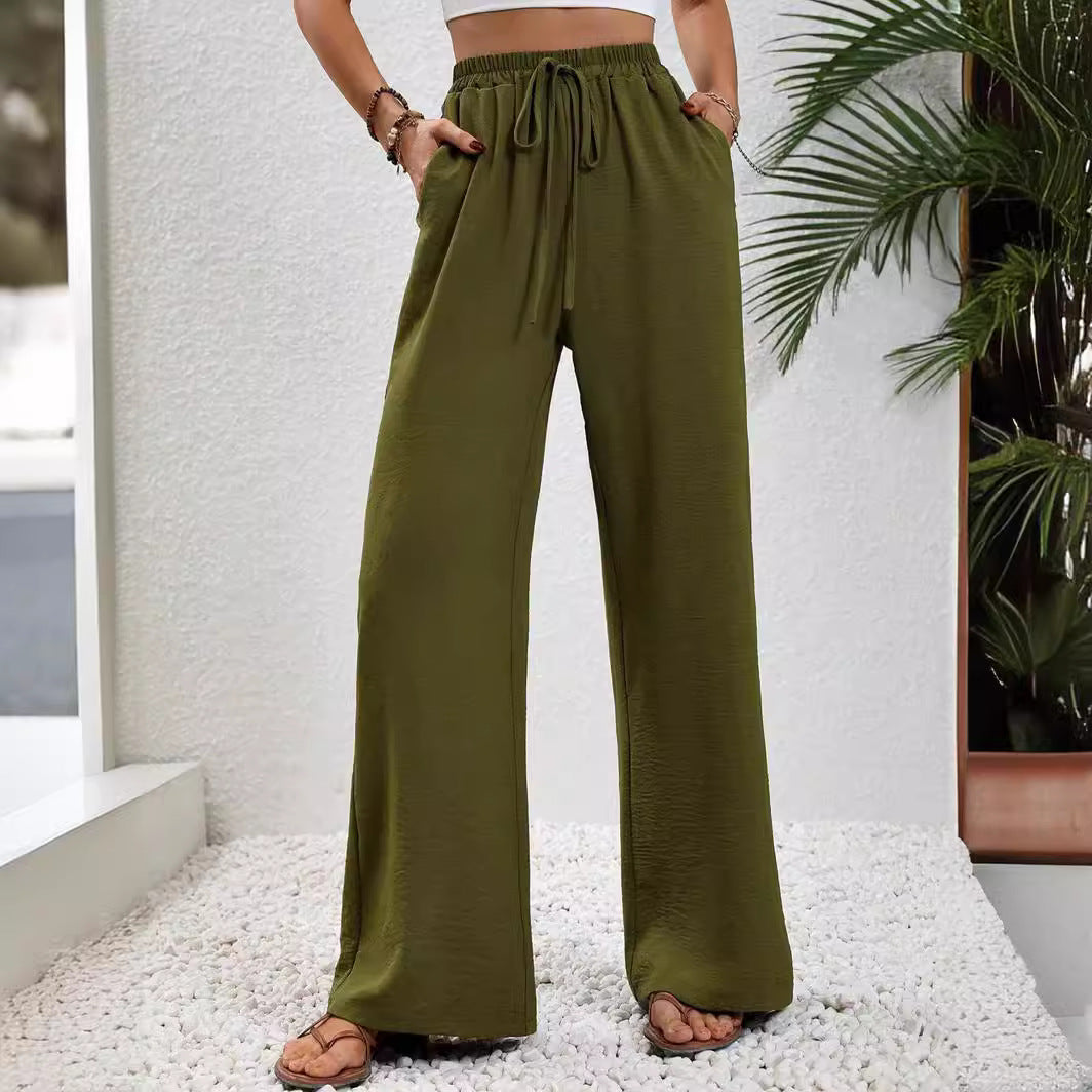 Pantalons larges d'été pour femmes avec taille élastique et poches latérales pratiques Chic & Stil