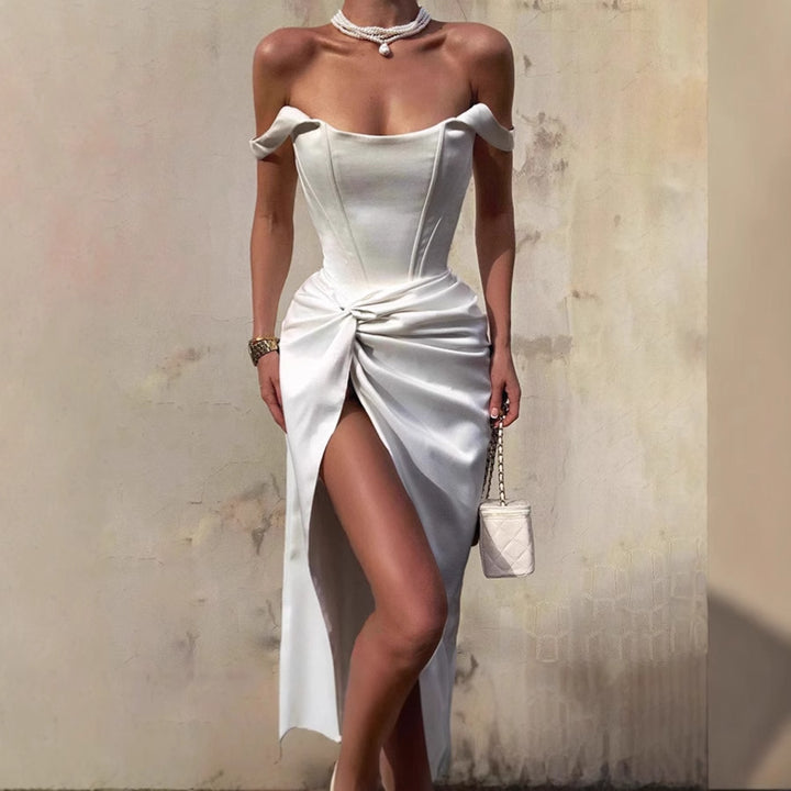 Elegant maxi dress for women with off-shoulder design, side slit, and refined draping Lune London