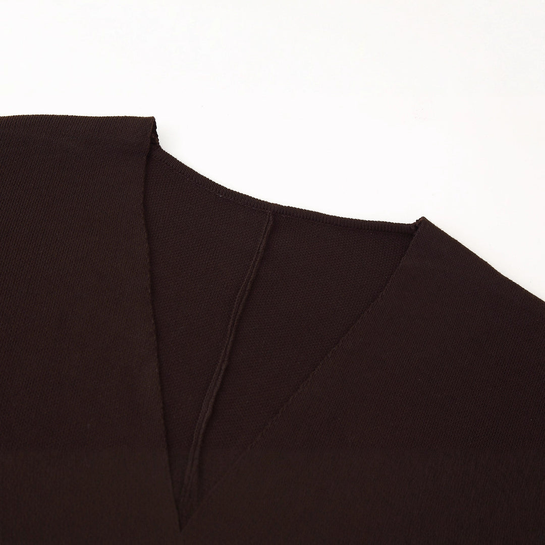 Women layered V-neck sweater with an elegant button detail Lune London
