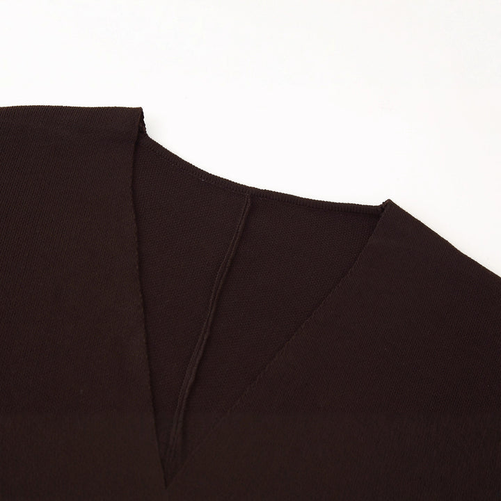 Women layered V-neck sweater with an elegant button detail Lune London