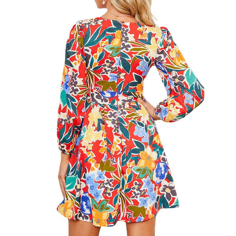 Short dress for women with narrow V-neck and long puff sleeves Lune London
