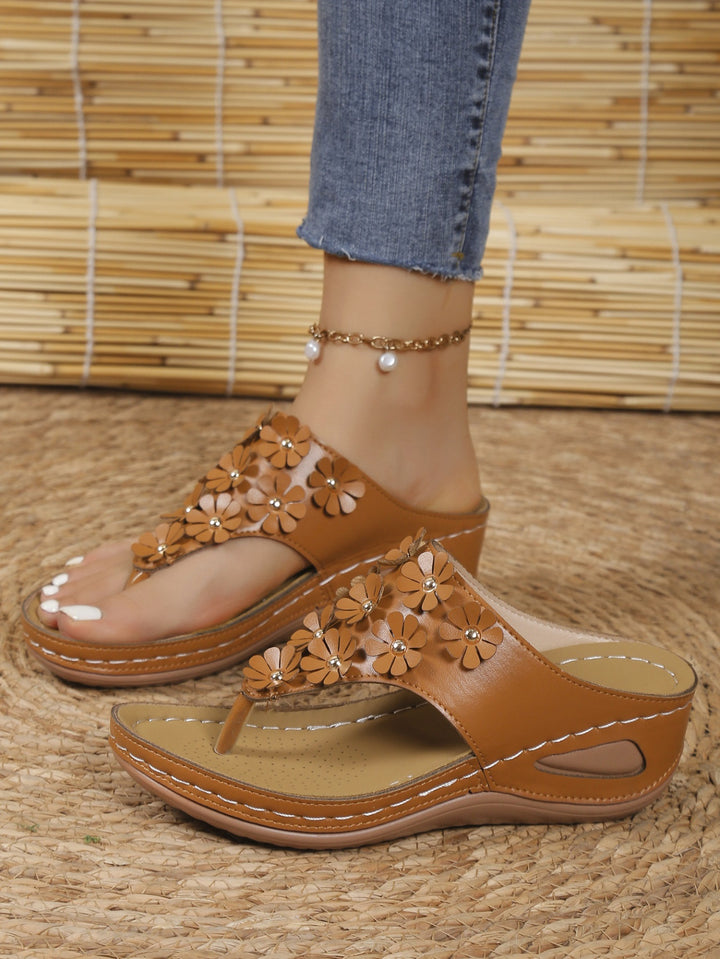 Elegant flip-flop sandals for women with floral appliqués Lune London