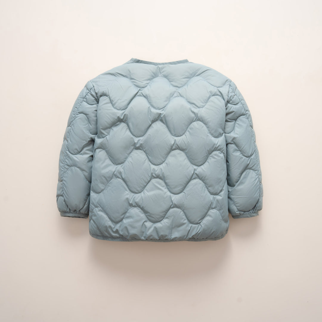Quilted down jacket for women with modern wave patterns and practical pockets Lune London