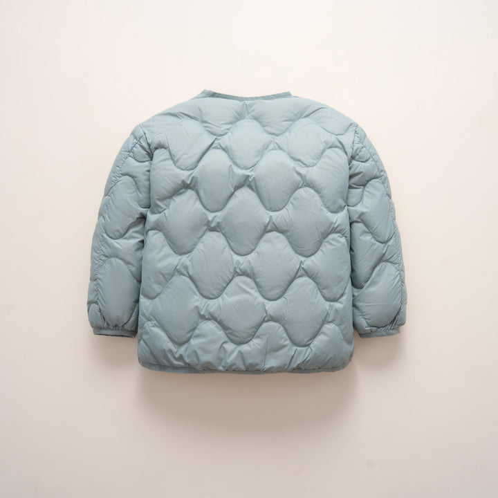 Quilted down jacket for women with modern wave patterns and practical pockets Lune London