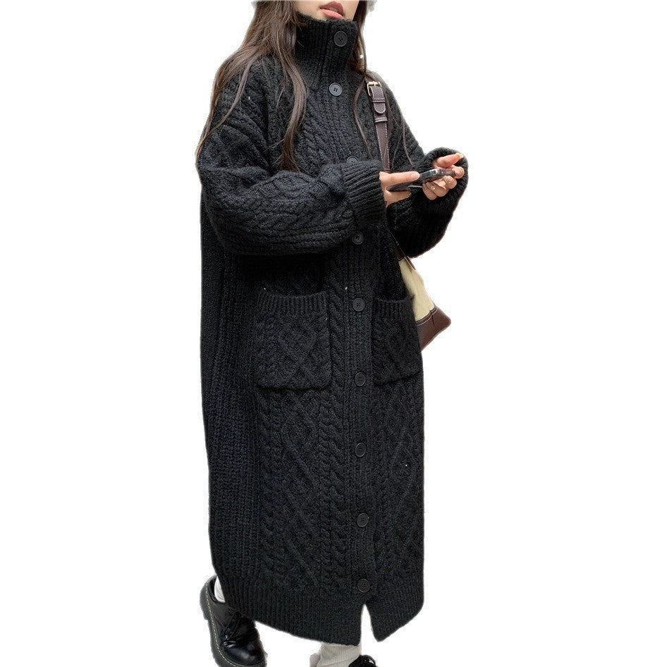 Thick knit button coat for ladies with an elegant cable pattern and practical pockets Lune London