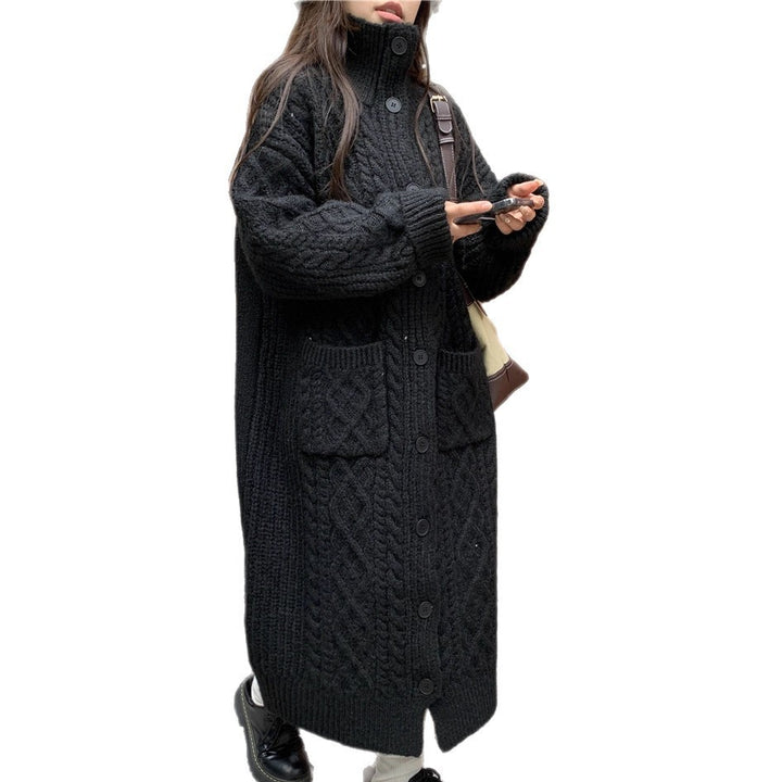 Thick knit button coat for ladies with an elegant cable pattern and practical pockets Lune London