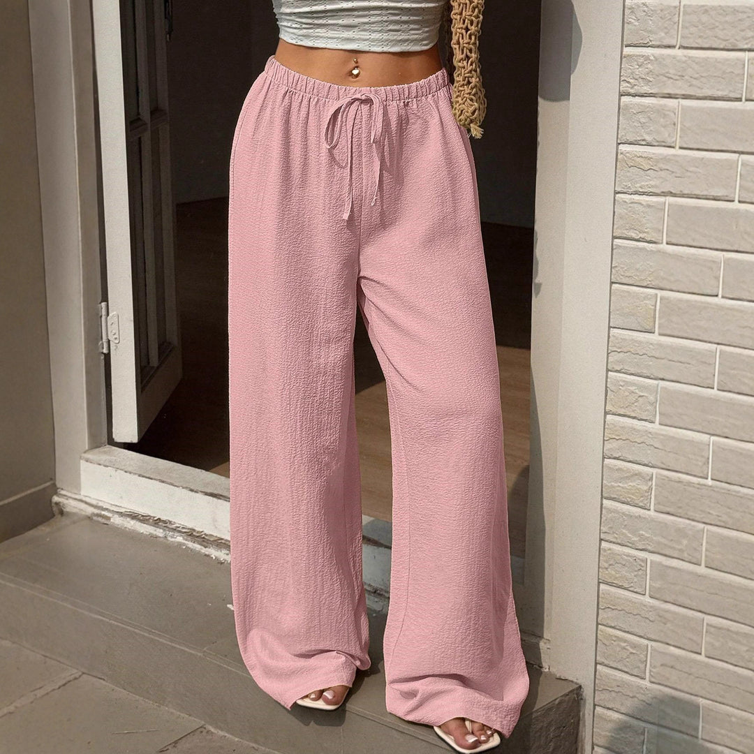 Wide Palazzo pants for women in lightweight and breathable material with elastic waistband Lune London