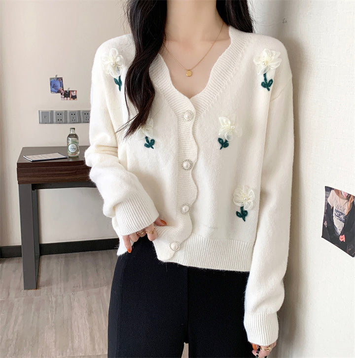 Playful women's cardigan button with floral embroidery and pearl buttons Lune London