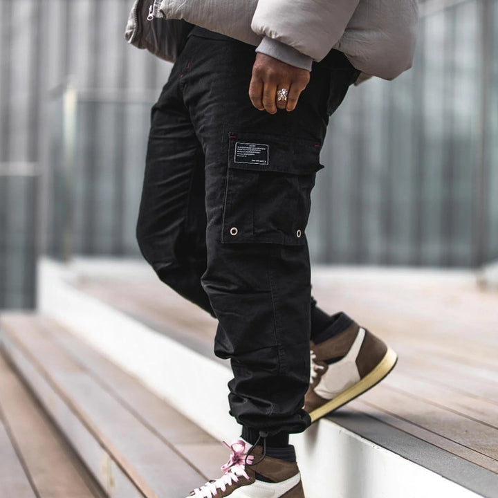 Functional cargo pants for men with elastic waistband and multiple pockets Lune London