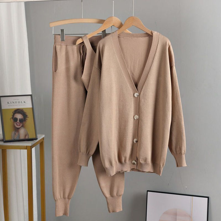 Elegant knitted women's outfit with chic button details