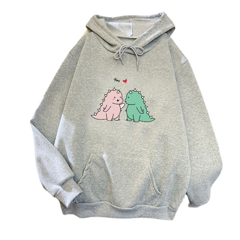 Women’s hoodie with playful dinosaur motif Chic & Stil