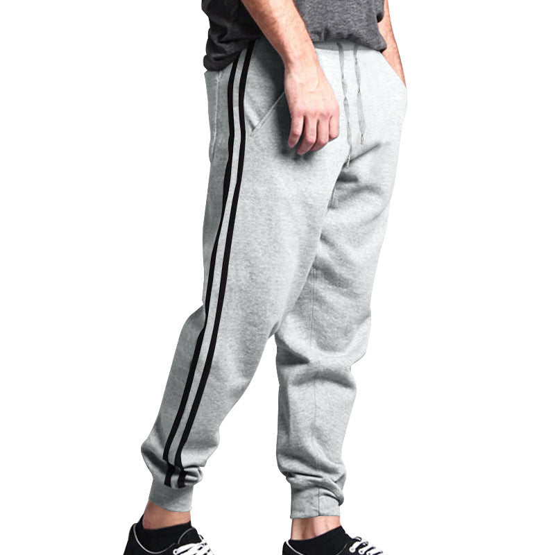 Sporty men's jogger pants with contrasting side stripes and an elastic waistband Lune London