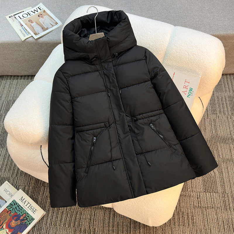 Insulated quilted jacket for women with a high collar and functional zip pockets Lune London