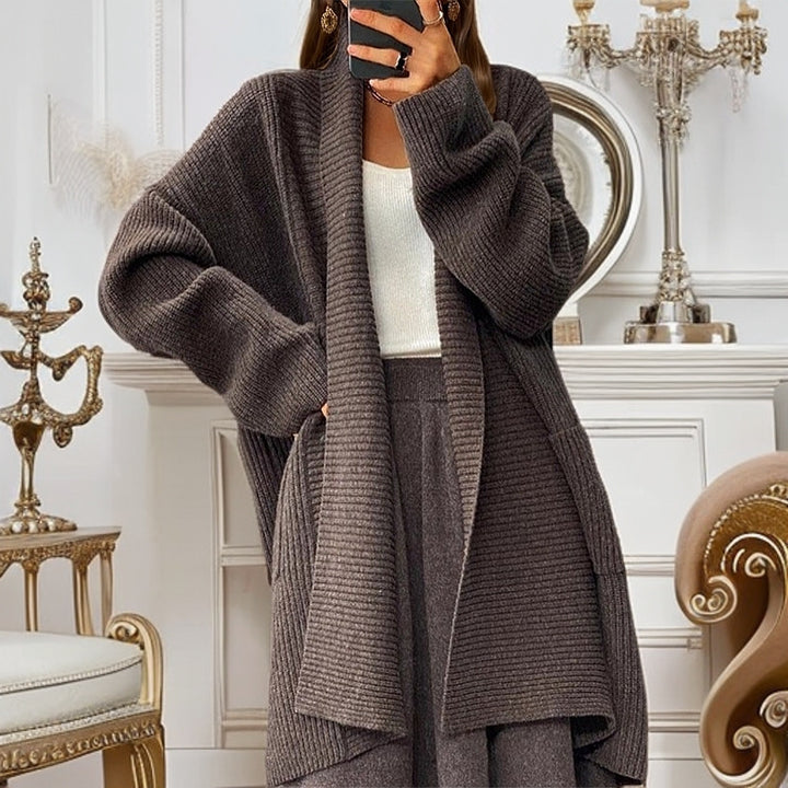 Long knitted coat for women with textured design and pockets Lune London