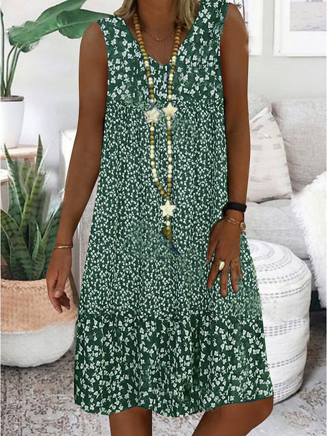 Airy summer dress for women with a playful floral pattern and a fluid silhouette Lune London