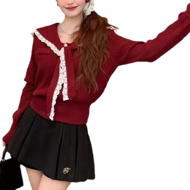 Knitted jacket for women with ruffled collar and decorative buttons Lune London