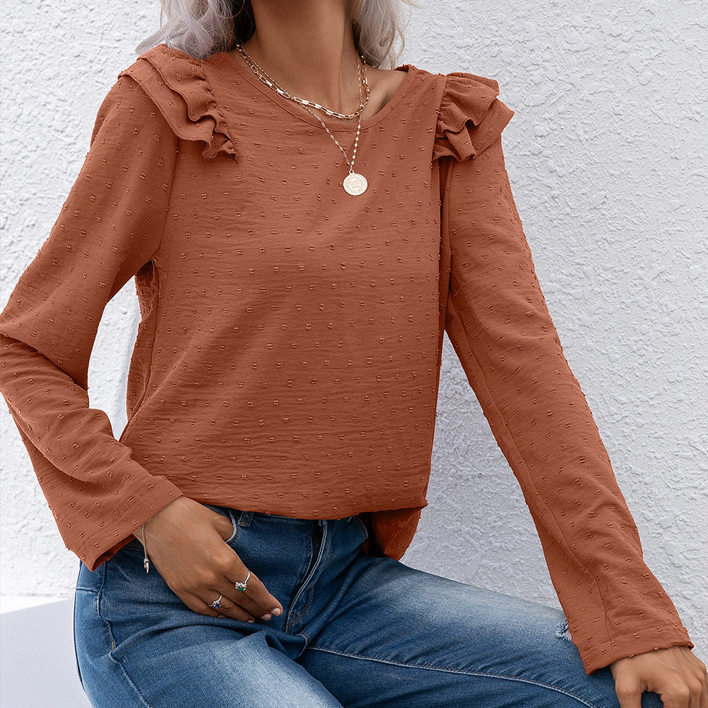 Casual women's top with ruffle details and textured surface Lune London