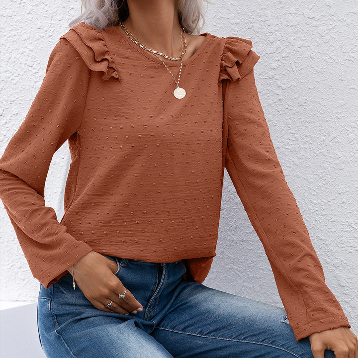Casual women's top with ruffle details and textured surface Lune London