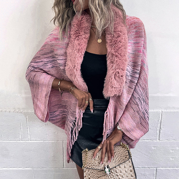 Elegant poncho for ladies with luxurious faux fur collar and fringed hem Lune London