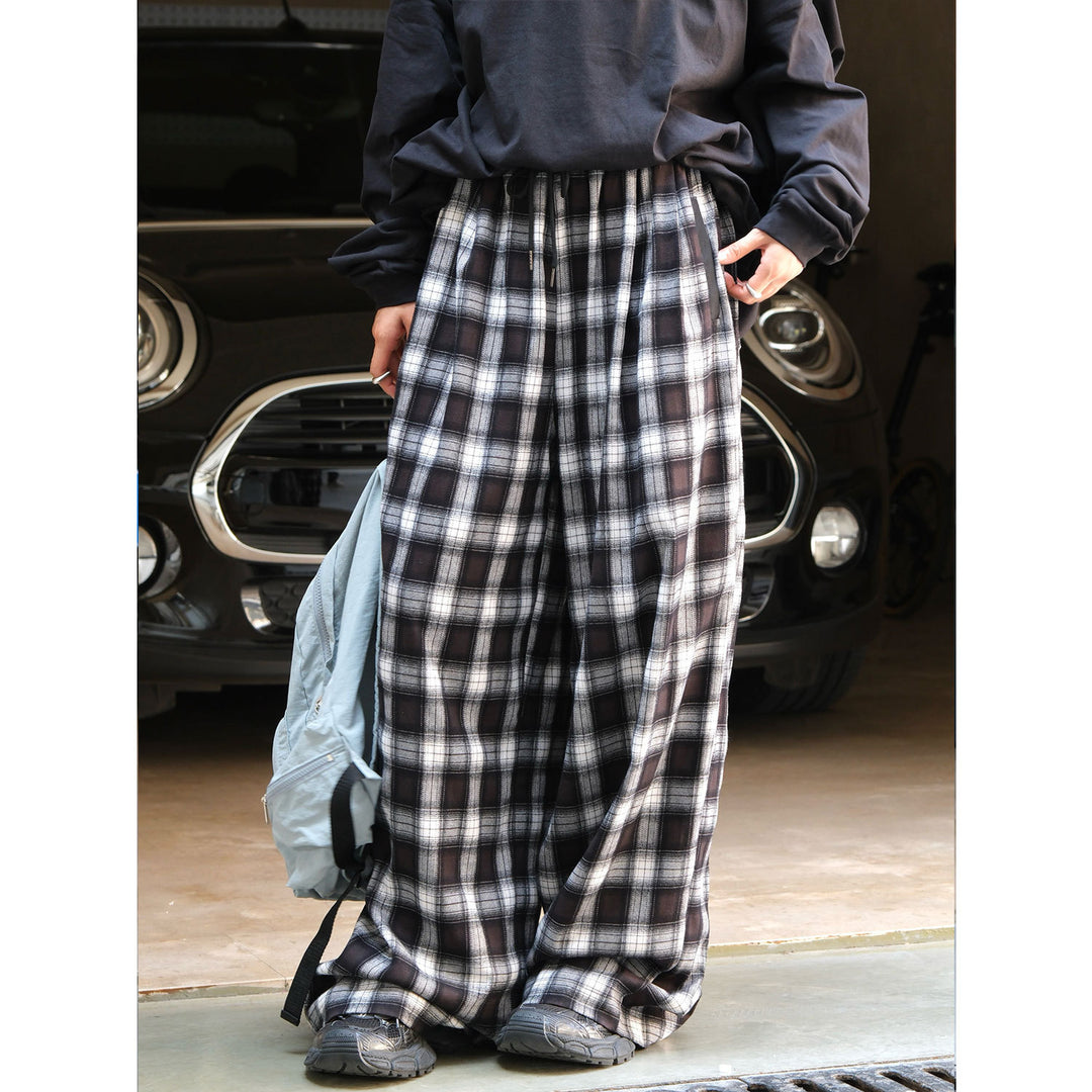 Pantalon à carreaux confortable pour femmes avec taille élastique et poches latérales Chic & Stil
