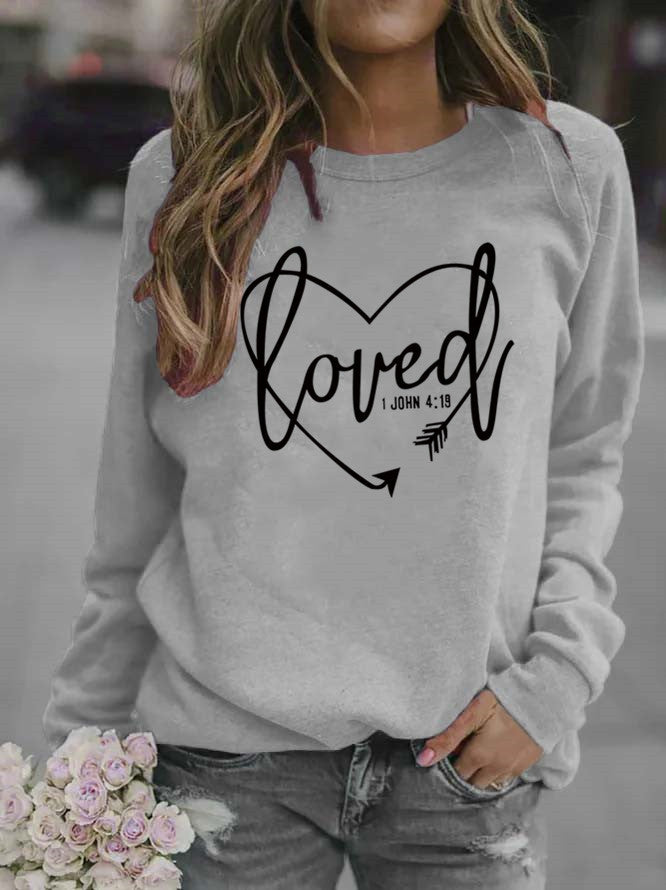 Sweatshirt pour femmes avec imprimé en forme de cœur et message inspirant Chic & Stil