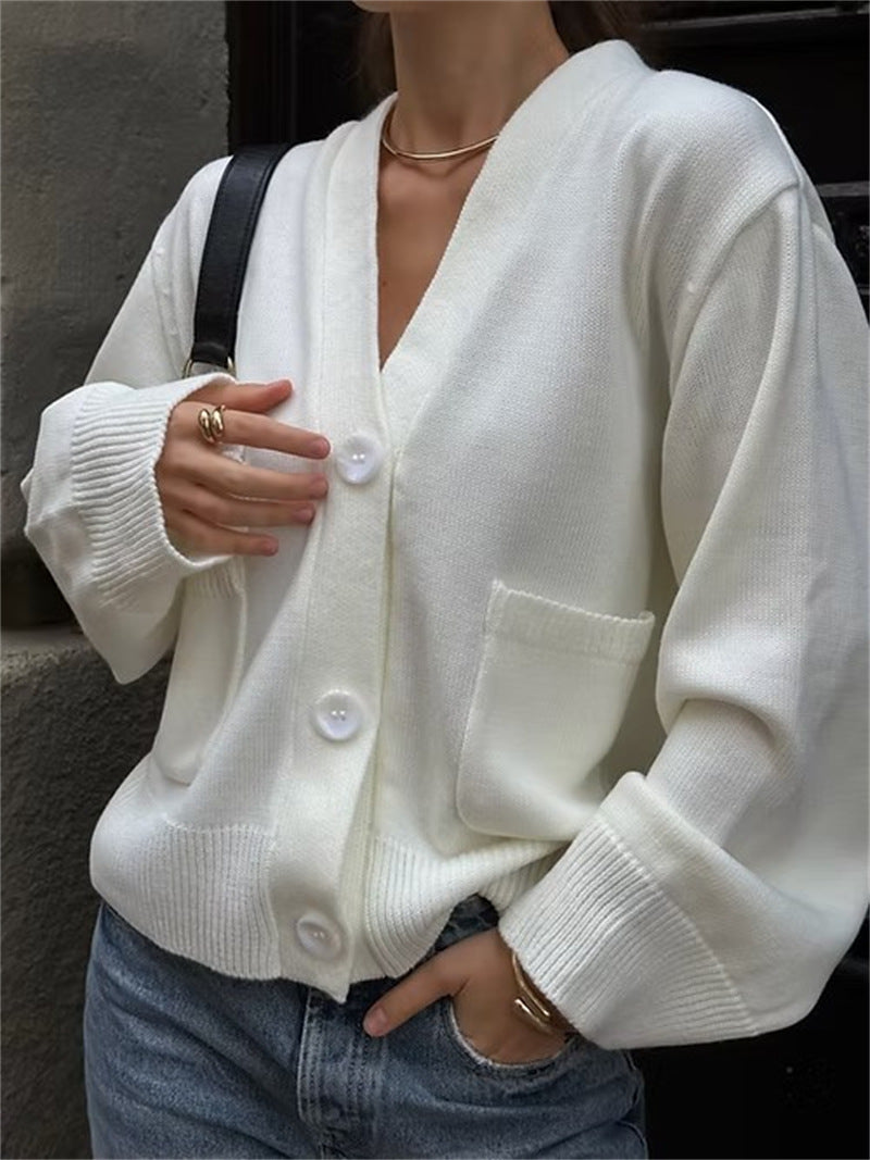 Ladies casual knitted cardigan with large pockets and button closure Lune London
