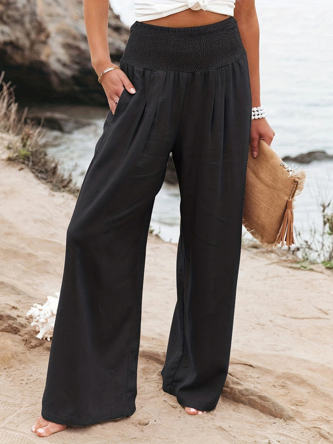 Loose summer pants for women with elastic waist and elegant draping Lune London