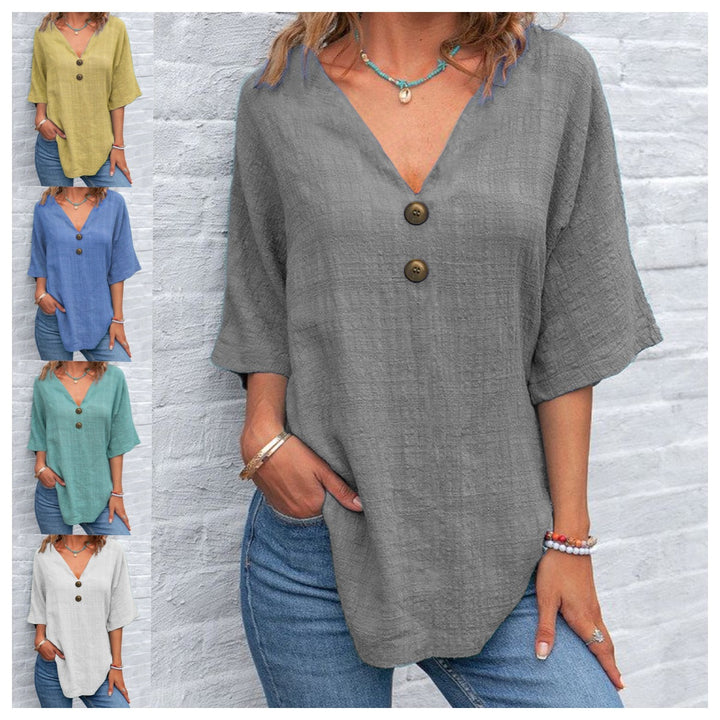 Ladies' V-neck blouse with decorative buttons and chic casual cut