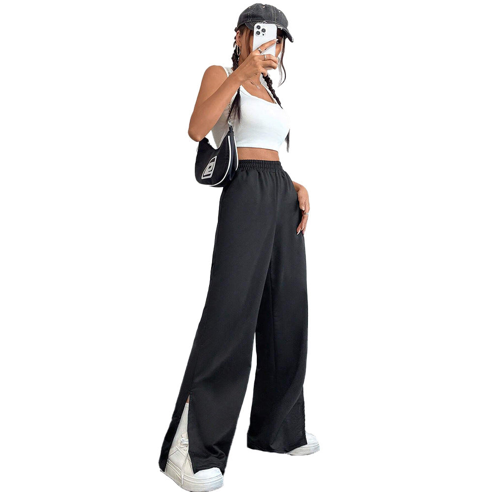 Pantalons satinés larges pour femmes avec taille élastique et fentes latérales Chic & Stil